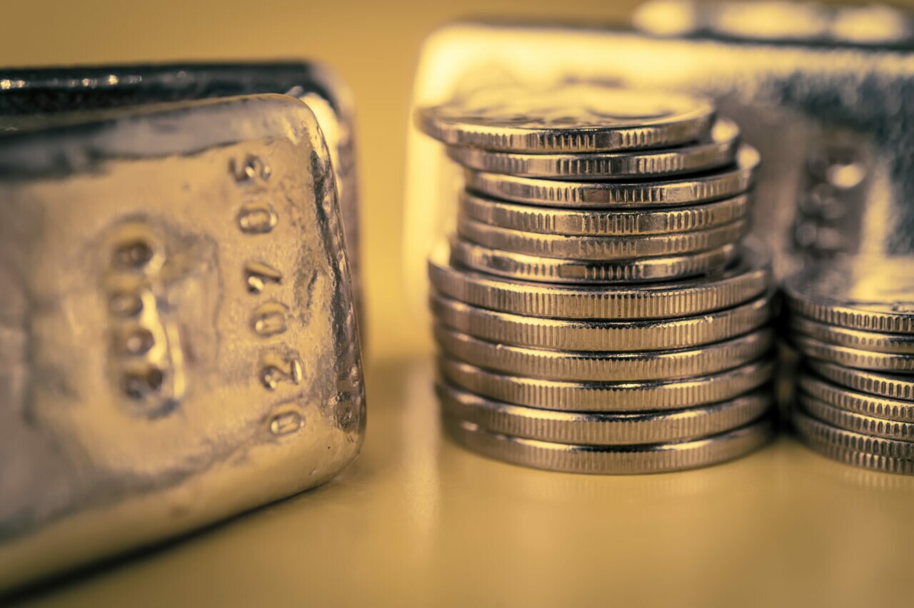 gold bars and silver coins